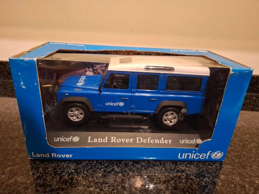 Hongwell UNICEF Land Rover Defender 1:24, Ophalen of Verzenden, Nieuw, Overige merken