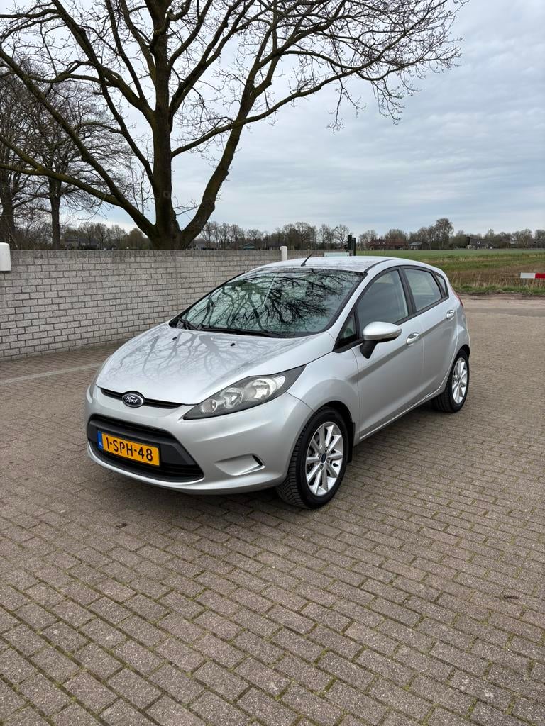 Ford Fiësta 1.25 5DR Grijs | nieuwe APK, Voorwielaandrijving, Euro 5, Stof, Overige kleuren