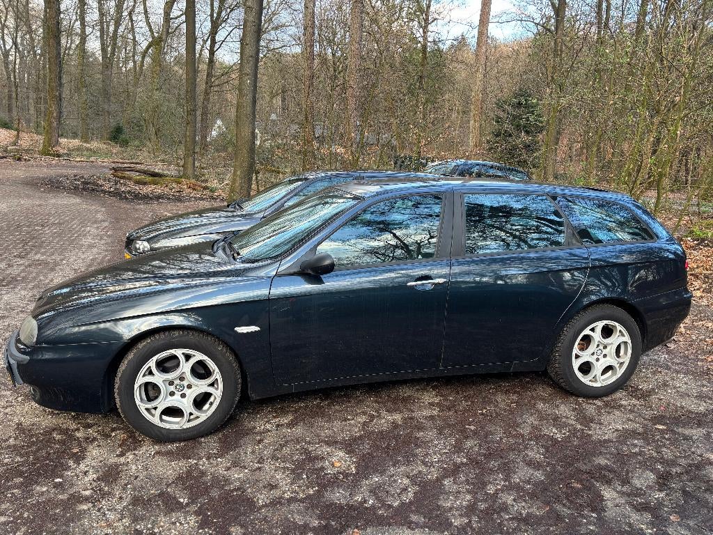 Alfa Romeo 156 2.5 V6 24V Sportwagon 2000 Blauw, Auto's, Voorwielaandrijving, 1345 kg, Zwart, Blauw