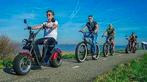 20% korting tour e-chopper/e-tuk tuk/e-steps Bollenstreek, Drie personen of meer, Kortingskaart