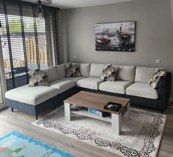 Hoekbank met hocker en extra setje hoes 