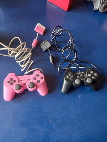 2 playstation 2 controllers
