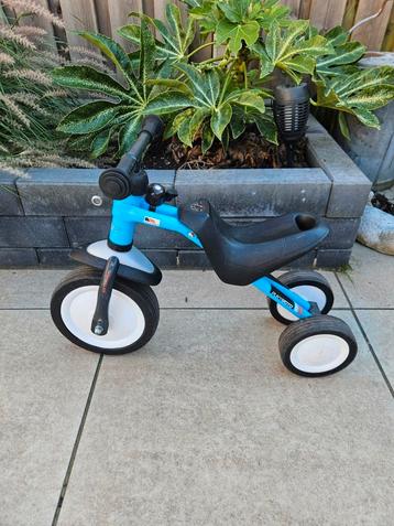 Nette blauwe Puky Pukymoto driewieler loopfiets beschikbaar voor biedingen