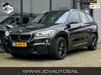 BMW X1 SDrive20i Centennial High Executive M-Sport/PANO/LEER, 1998 cc, Euro 6, Lichtsensor, Zwart