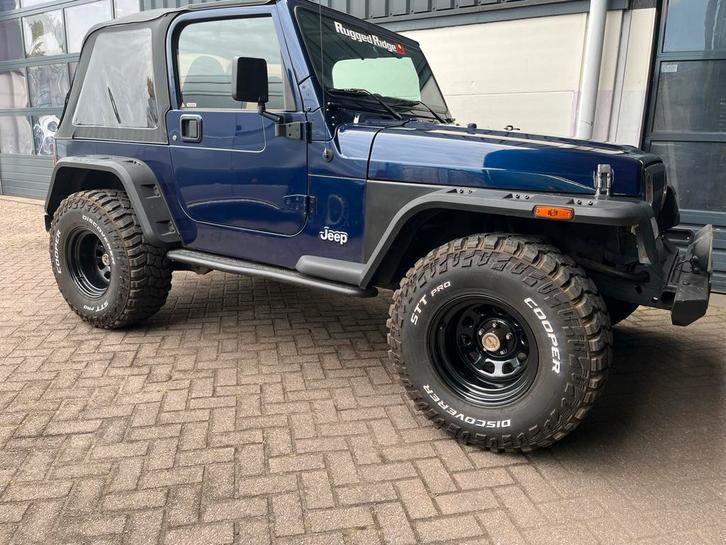 Jeep Wrangler 4.0 I 130KW  soft top 132450 nap, Auto's, Jeep, Particulier, Te koop, Wrangler, 4x4, Open dak, Radio, Trekhaak, USB