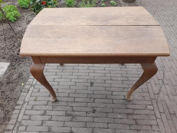 Houten eetkamer tafel met sierpoten, antiek, curiosa beschikbaar voor biedingen