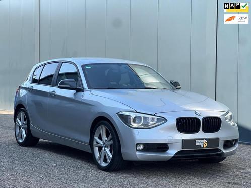 BMW 1-serie 118i Leder|Xenon|NAP|Trekhaak|Topstaat!, Auto's, BMW, Bedrijf, Te koop, 1-Serie, ABS, Airbags, Airconditioning, Bochtverlichting