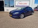 Opel Astra 1.4 Turbo Business Executive Automaat, Auto's, Gebruikt, Euro 6, 150 pk, Blauw