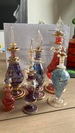 Parfum flesjes., Ophalen