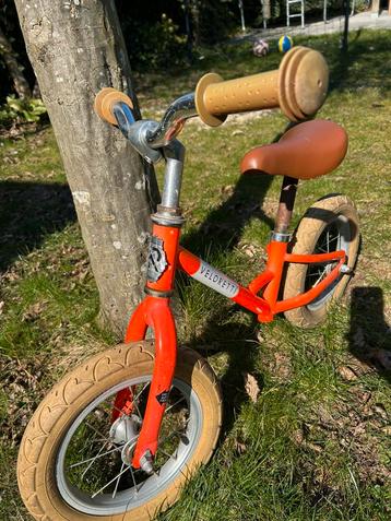 Oranje veloretti loopfiets beschikbaar voor biedingen
