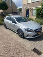 Mercedes-Benz A-Klasse A180 BE 122pk 2017 Grijs, Auto's, Voorwielaandrijving, 65 €/maand, Zwart, Leder en Stof