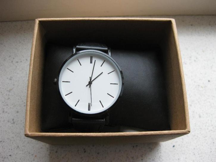 Horloge Kiomi zwart, Sieraden, Tassen en Uiterlijk, Horloges | Dames, Zo goed als nieuw, Polshorloge, Overige merken, Overige materialen