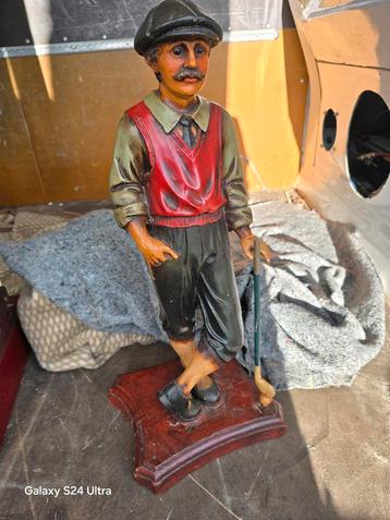 Golfer Antieke op voetstuk  beschikbaar voor biedingen