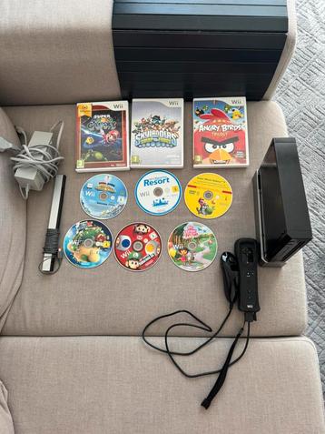 Nintendo Wii + accessoires en spellen  beschikbaar voor biedingen