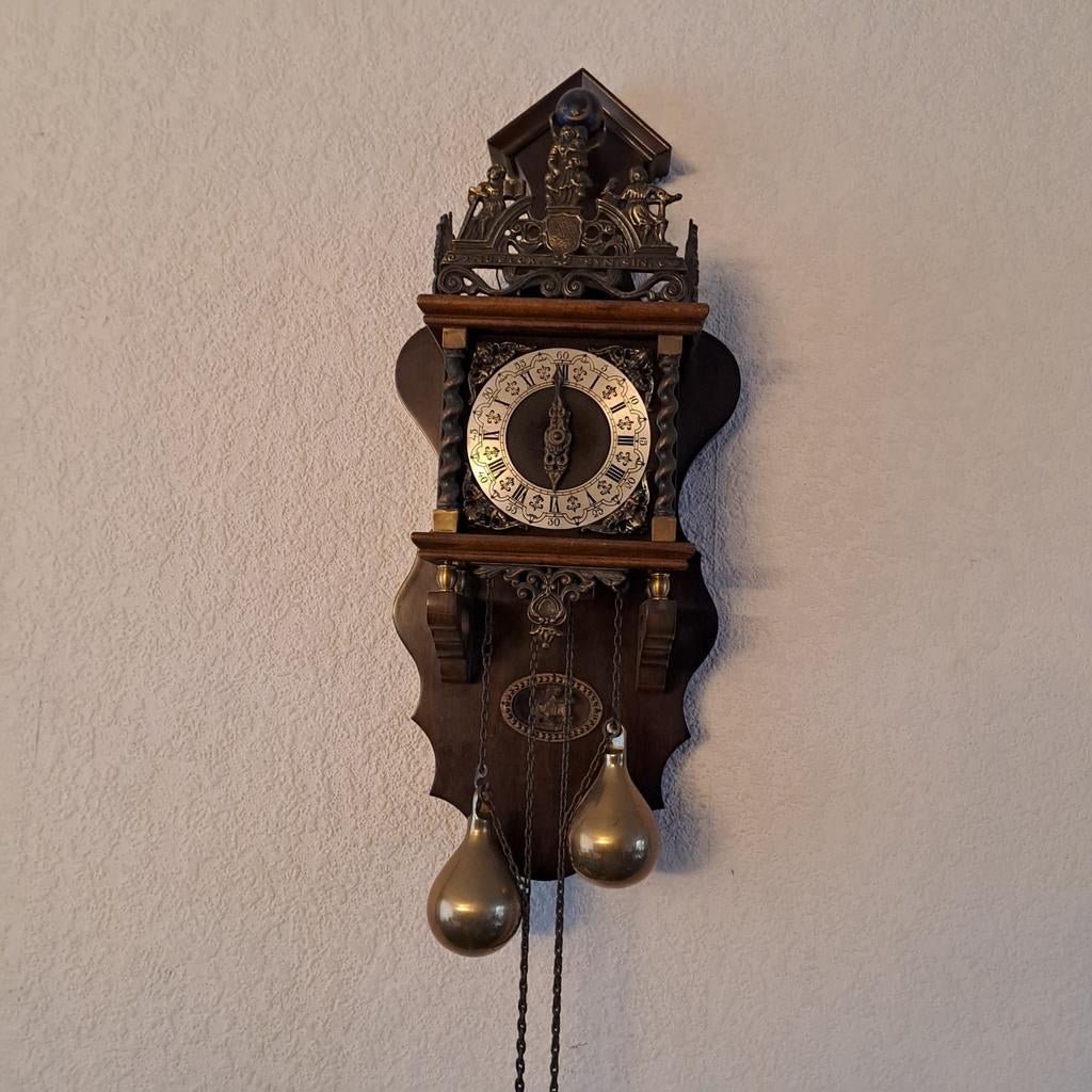 Zaanse klok, Ophalen