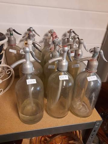 Div mooie oude spuit flessen 12.50 p.s  beschikbaar voor biedingen