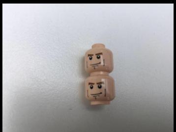 Te koop 2 x hoofd van Lego Spiderman poppetje Harry Osborne beschikbaar voor biedingen