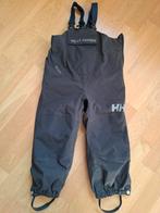 Grijze Helly Hansen kinder regenbroek / tuinbroek - z.g.a.n., Ophalen of Verzenden, Zo goed als nieuw, Helly Hansen, Jongen of Meisje