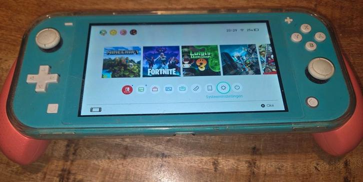 Nintendo Switch Lite Turquoise + Extra's, Spelcomputers en Games, Games | Nintendo Switch, Gebruikt, Overige genres, 1 speler