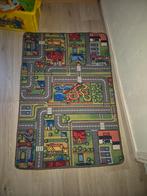 Speelkleed met straten en gebouwen, Ophalen