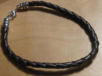 arm. gevlochten bruin lederen ARMBAND (2) beschikbaar voor biedingen