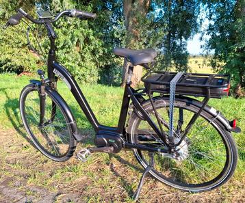 Zeer nette zwarte elektrische damesfiets, Middenmotor ✅️ beschikbaar voor biedingen