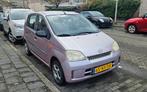 Daihatsu Cuore 1.0 5D 2004 Roze/lila, Stof, 600 kg, Zwart, Centrale vergrendeling