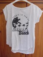 Leuke witte top/shirt met zwarte print, maat M/L, Wit, Zo goed als nieuw, Korte mouw, Ophalen