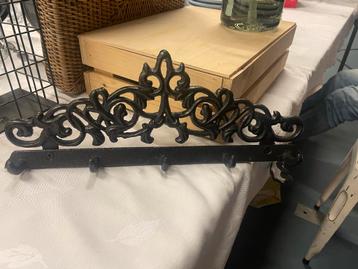 Gietijzeren kinderkapstok beschikbaar voor biedingen