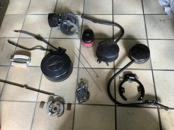 Solex onderdelen oa carburateur, carter, uitlaat, boeken etc beschikbaar voor biedingen