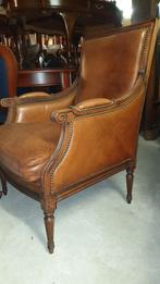 Gedelux schapenleder fauteuil, Ophalen