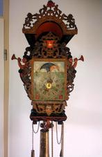 Friese stoelklok, Ophalen