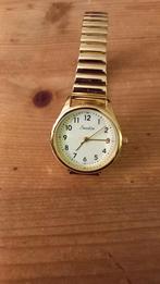 Horloge met goudkleurige band., Ophalen of Verzenden, Nieuw, Overige merken
