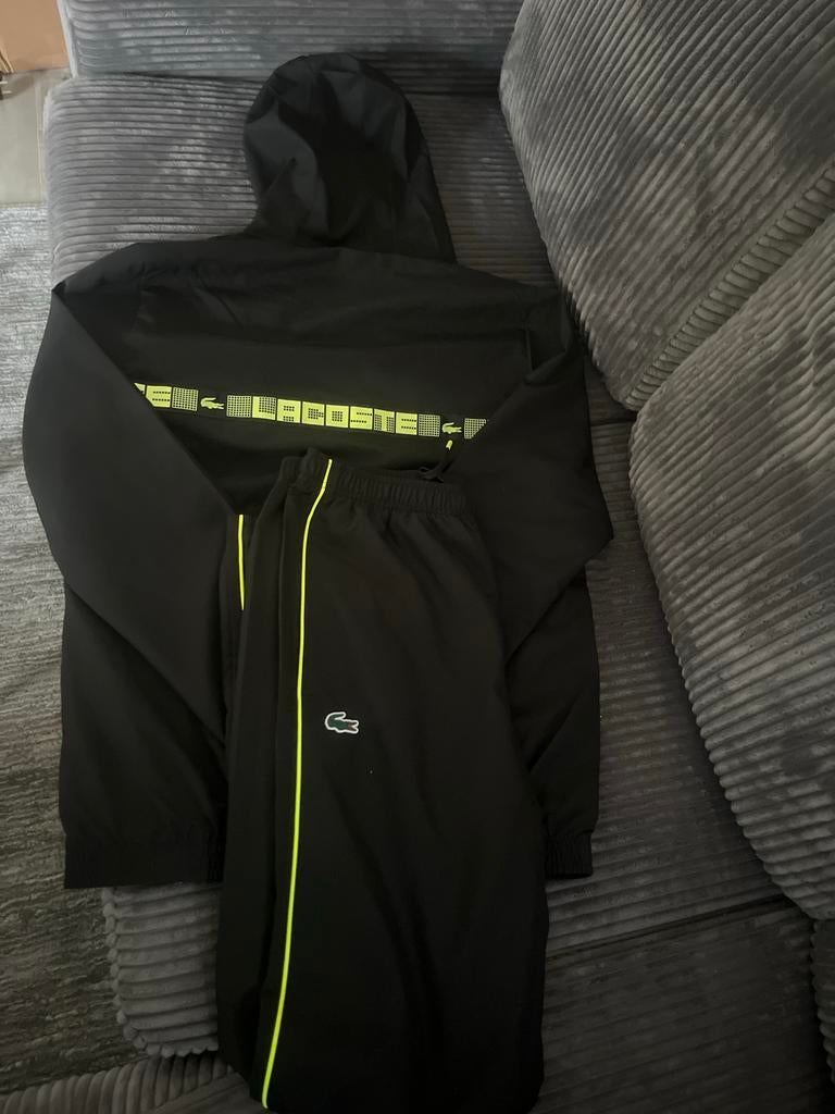 Lacoste trainingspak. Nieuw en origineel. Maat S, Kleding | Dames, Sportkleding, Nieuw, Overige typen, Maat 36 (S), Zwart, Ophalen of Verzenden