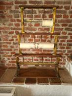 Antieke papierhouder, Ophalen