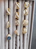 Diverse gouden kleur ringen met - Nieuw, Met kristal, Nieuw, Ophalen of Verzenden, Dame