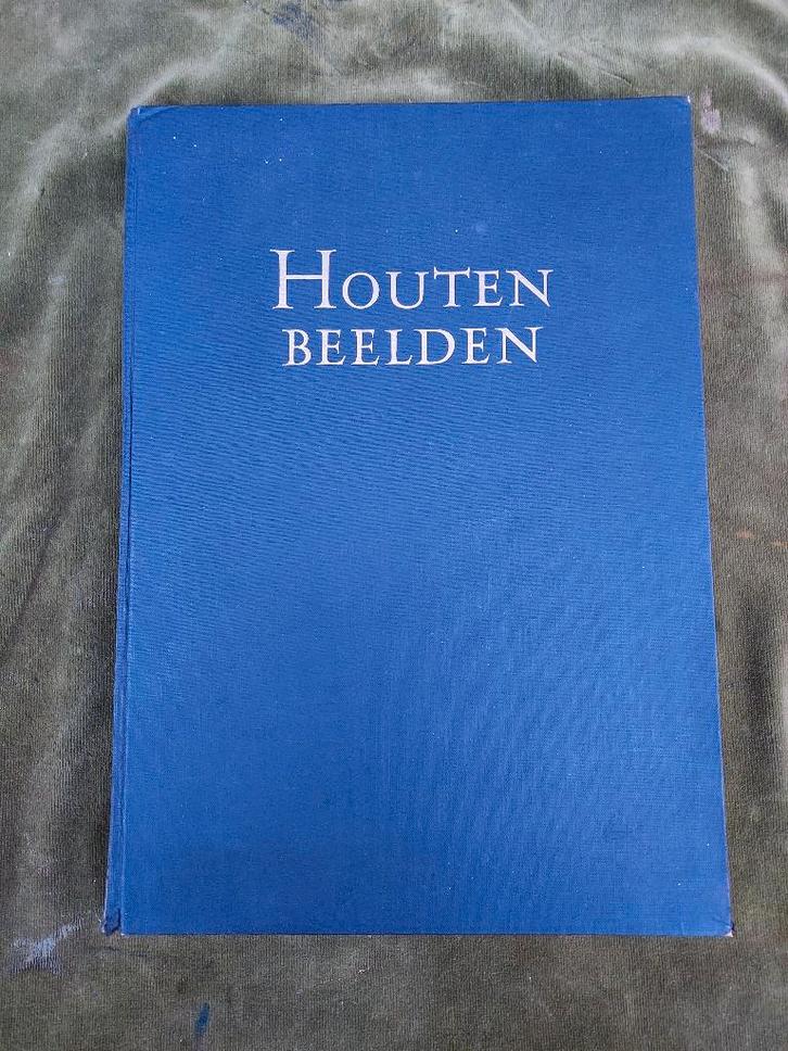Boek over beeldbouwkunst, houten beelden., Antiek en Kunst, Antiek | Boeken en Bijbels, Verzenden