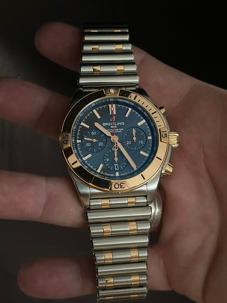Breitling Chronomat B01 Roségoud/ blauwe wijzerplaat., Ophalen, Staal, Breitling, Polshorloge