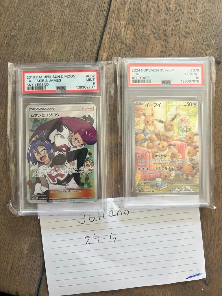 PSA 9 Jessie & James en PSA 10 Eevee Slabs., Ophalen of Verzenden, Zo goed als nieuw, Meerdere kaarten