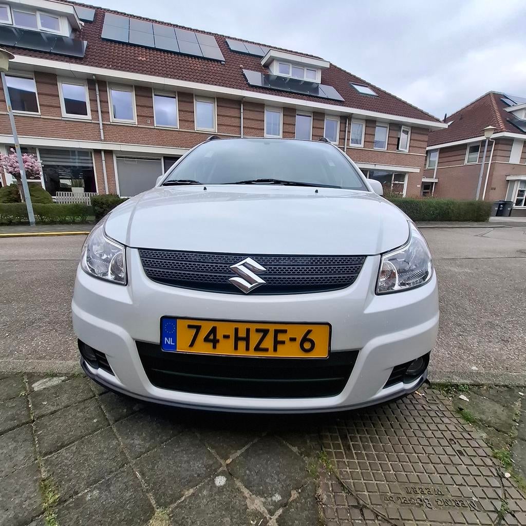 Suzuki SX4 1.6 79KW 2009 Wit, Auto's, Suzuki, 15 km/l, 4 cilinders, Origineel Nederlands, 1200 kg
