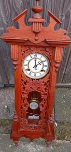 Antieke hangklok, Ophalen