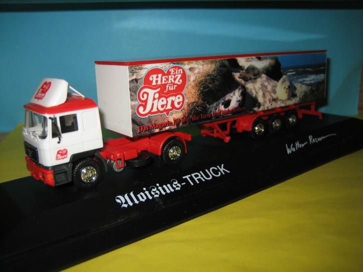 Herz fur Tiere  MAN met oplegger in PC-vitrine Herpa, Hobby en Vrije tijd, Modelauto's | 1:87, Zo goed als nieuw, Bus of Vrachtwagen