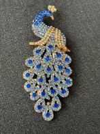 Elegante koningsblauwe  pauw broche, Ophalen of Verzenden, Overige materialen