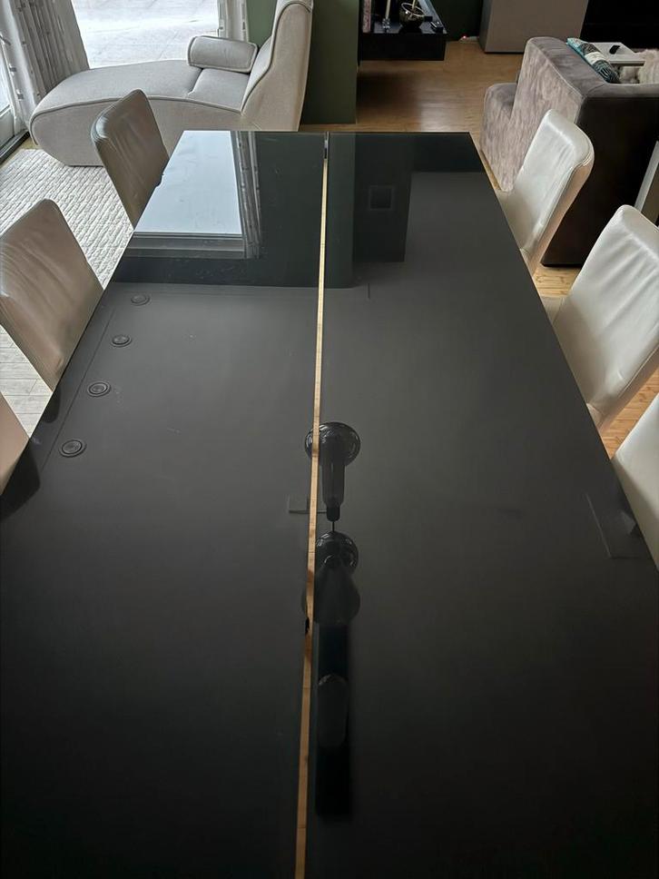 Eettafel met donker glazen blad en RVS poten, Huis en Inrichting, Tafels | Eettafels, Gebruikt, 100 tot 150 cm, 200 cm of meer