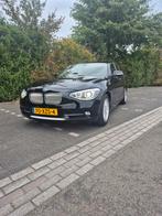 BMW 1-Serie 116I 100KW 5DR 2012 Zwart nieuwe apk, Auto's, 1-Serie, 65 €/maand, Zwart, 4 cilinders