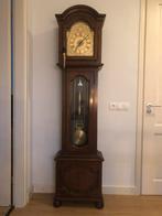 Staande Klok, Ophalen