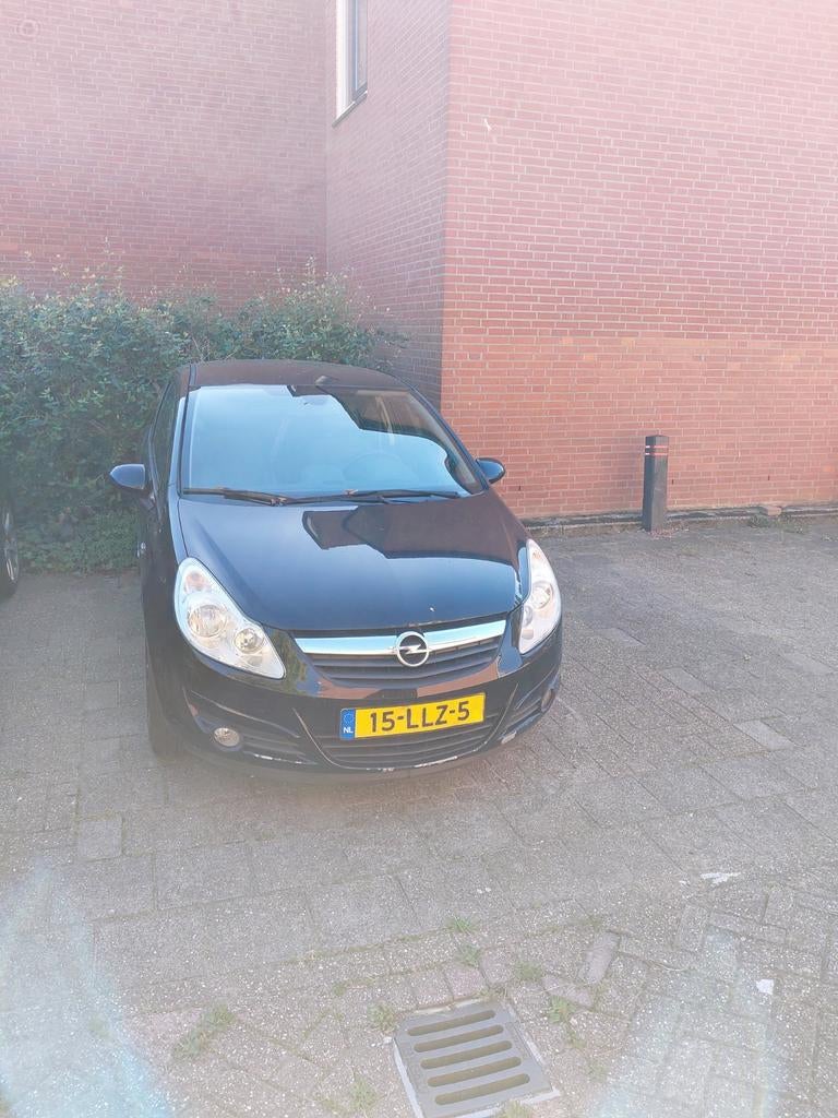Opel Corsa 1.4 16V 3D 2010 Zwart met nieuwe APK, Auto's, Opel, Voorwielaandrijving, 101 pk, 4 cilinders, Zwart