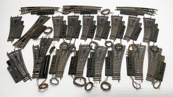 25-06: 20 Loop/sloop/onderdelen elektrische/hand wissels  H0 beschikbaar voor biedingen