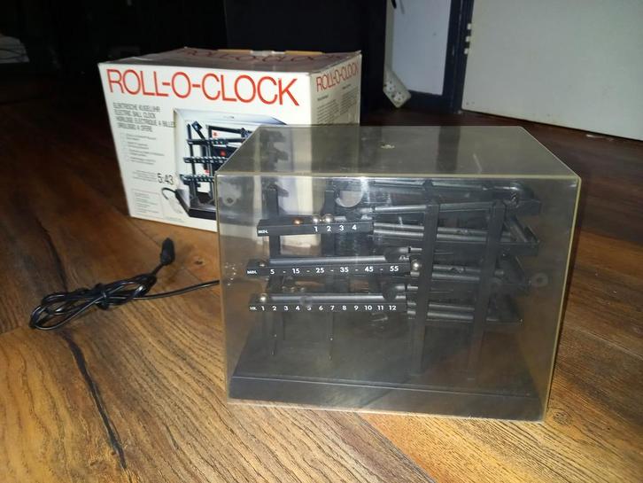 Roll-O-Clock Elektrische Kogelklok, Antiek en Kunst, Antiek | Klokken, Ophalen of Verzenden