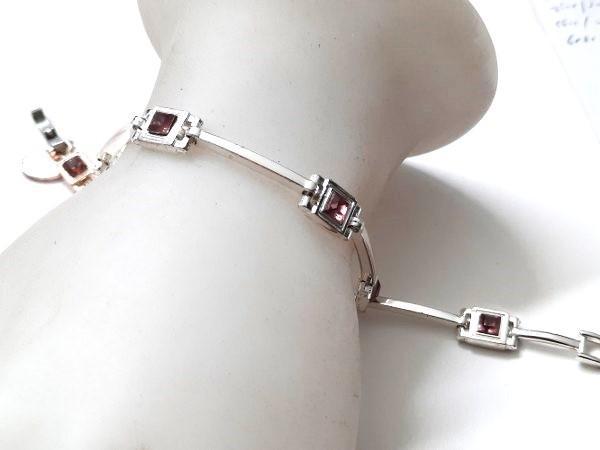 Avon zilverkleurige armband met amethistkleurige stenen, Sieraden, Tassen en Uiterlijk, Armbanden, Zo goed als nieuw, Overige materialen